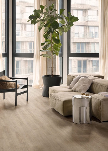 Moduleo Blackjack Oak 22210 flooring in a furnished room